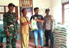 Babinsa Koramil Muting Dampingi Penyaluran Beras Untuk Warga