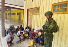 Senyum Cenderawasih di Kelas TNI: Satgas Raja Alam Merajut Harapan di Pedalaman Dokome