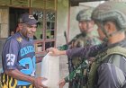 Marinir Perkuat Keamanan Papua Lewat Komsos dan Bantuan Warga