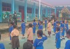 Marinir Latih Disiplin PBB Siswa SD Perbatasan Papua