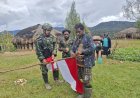 Satgas 408 Kibarkan Merah Putih di Jantung Papua Jelang Natal