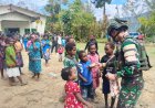 Satgas Yonif 113/JS Sebarkan Kasih Natal di Pogapa, Papua