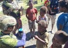 Satgas Yonif 500/Sikatan: Senyum Ceria Anak Papua di Libur Nataru