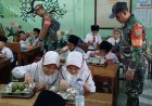 Dukung Tumbuh Kembang Optimal, Babinsa Abepura Tegaskan Pentingnya Gizi bagi Siswa