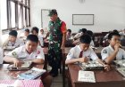 Program MBG, Babinsa Pastikan Paket Gizi Tersalur ke Ribuan Siswa
