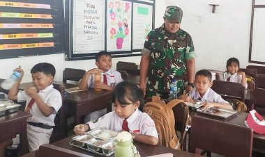 Babinsa Kodim 1701/Jayapura Terus Kawal Program Pemberian Makan Bergizi